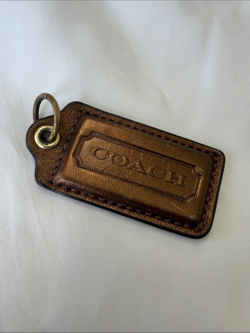 Coach Metallic Bronze Leather Hang Tag with Brass Ring